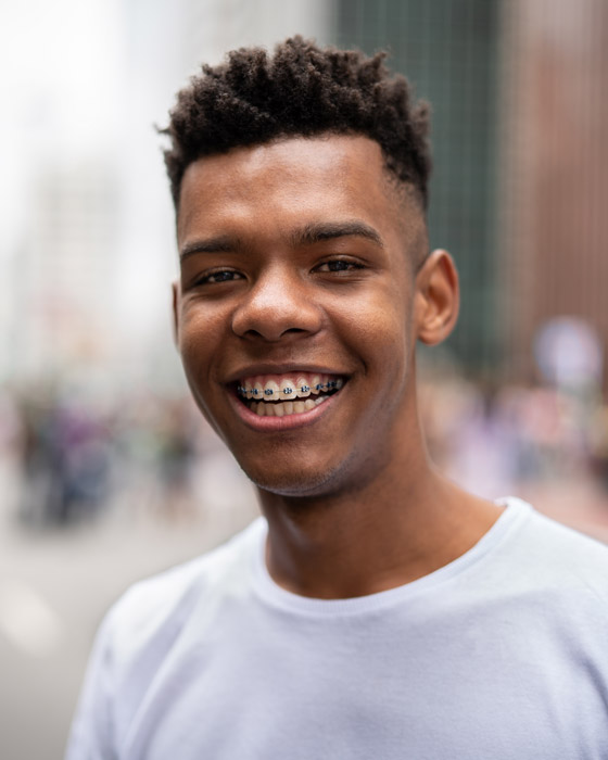 Patient with metal braces at Carmel, IN orthodontics office