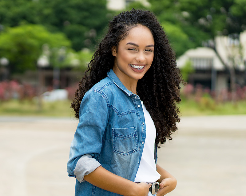 Patient with metal braces Carmel IN orthodontists