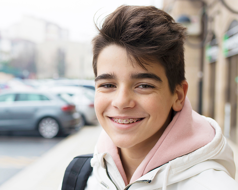 Patient with metal braces Carmel IN orthodontists